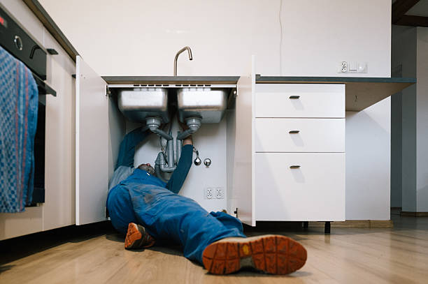 Professional Drain Cleaning technician working in Holly Springs, MS